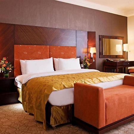 Amt Mena Lejlighedshotel Doha Værelse billede