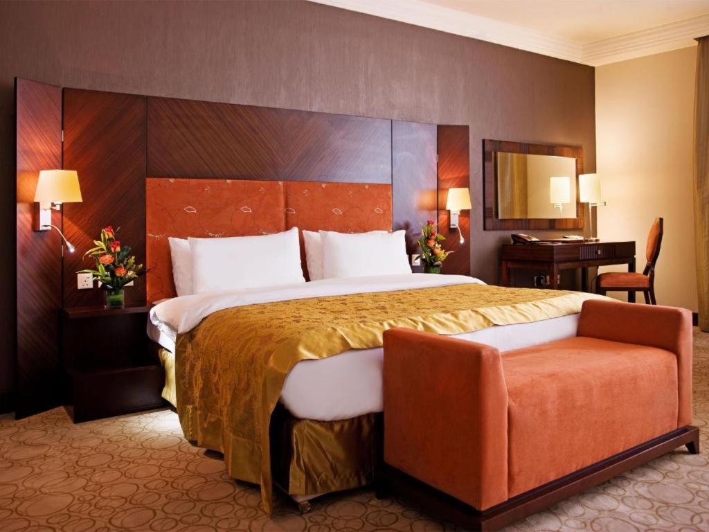 Amt Mena Lejlighedshotel Doha Værelse billede