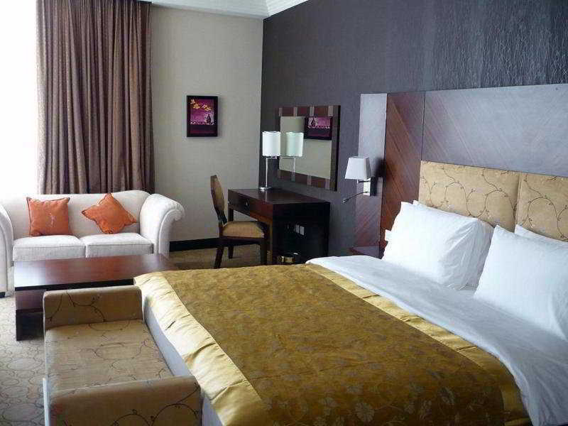 Amt Mena Lejlighedshotel Doha Værelse billede