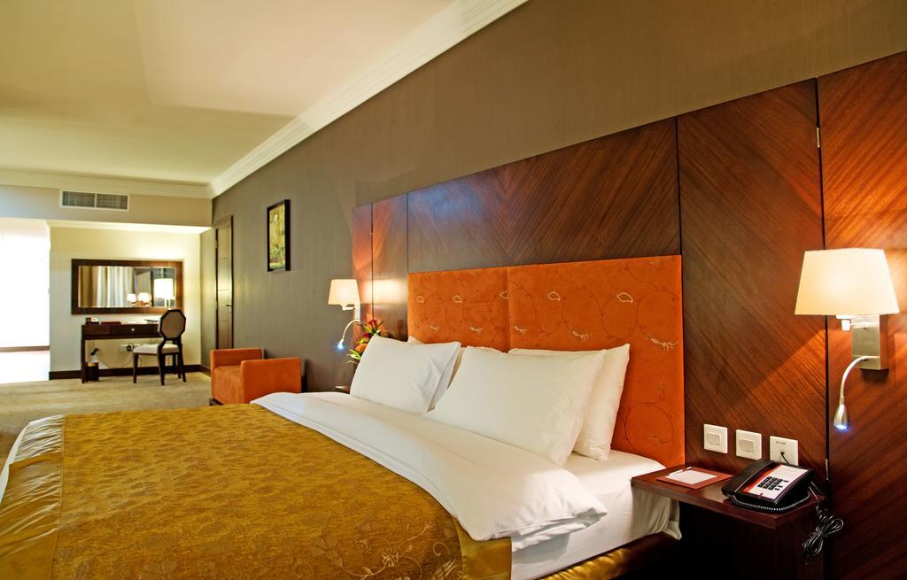Amt Mena Lejlighedshotel Doha Værelse billede